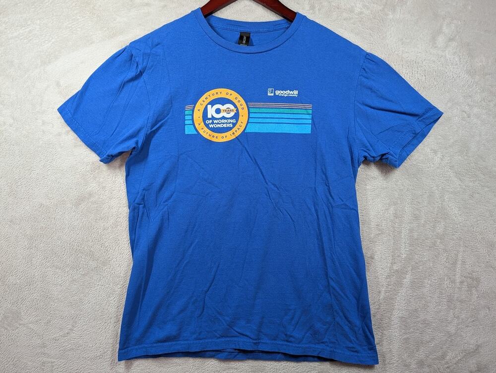 Goodwill OC Orange County 100 Years of Working Wonder Blue Shirt Size Medium